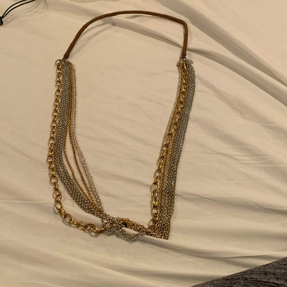 EUC multistrand necklace in gold and silver with brown band around the back